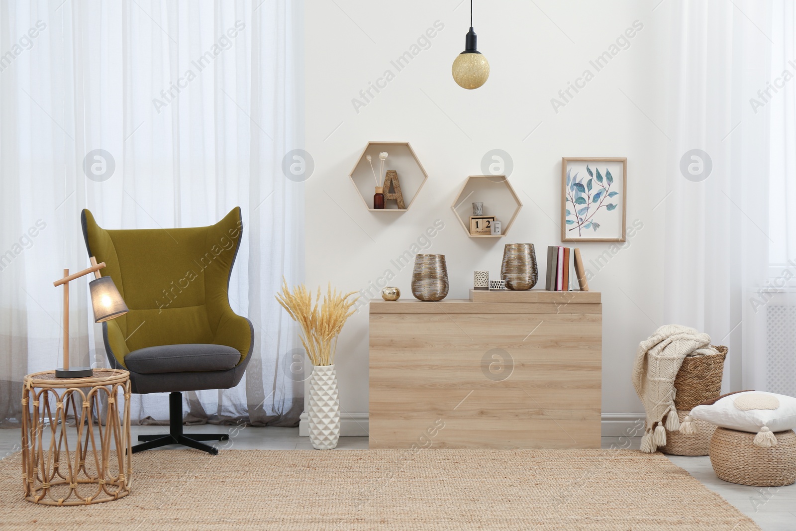 Photo of Stylish living room interior with comfortable armchair and wooden table