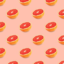 Image of Many fresh ripe grapefruits on pink background. Seamless pattern design