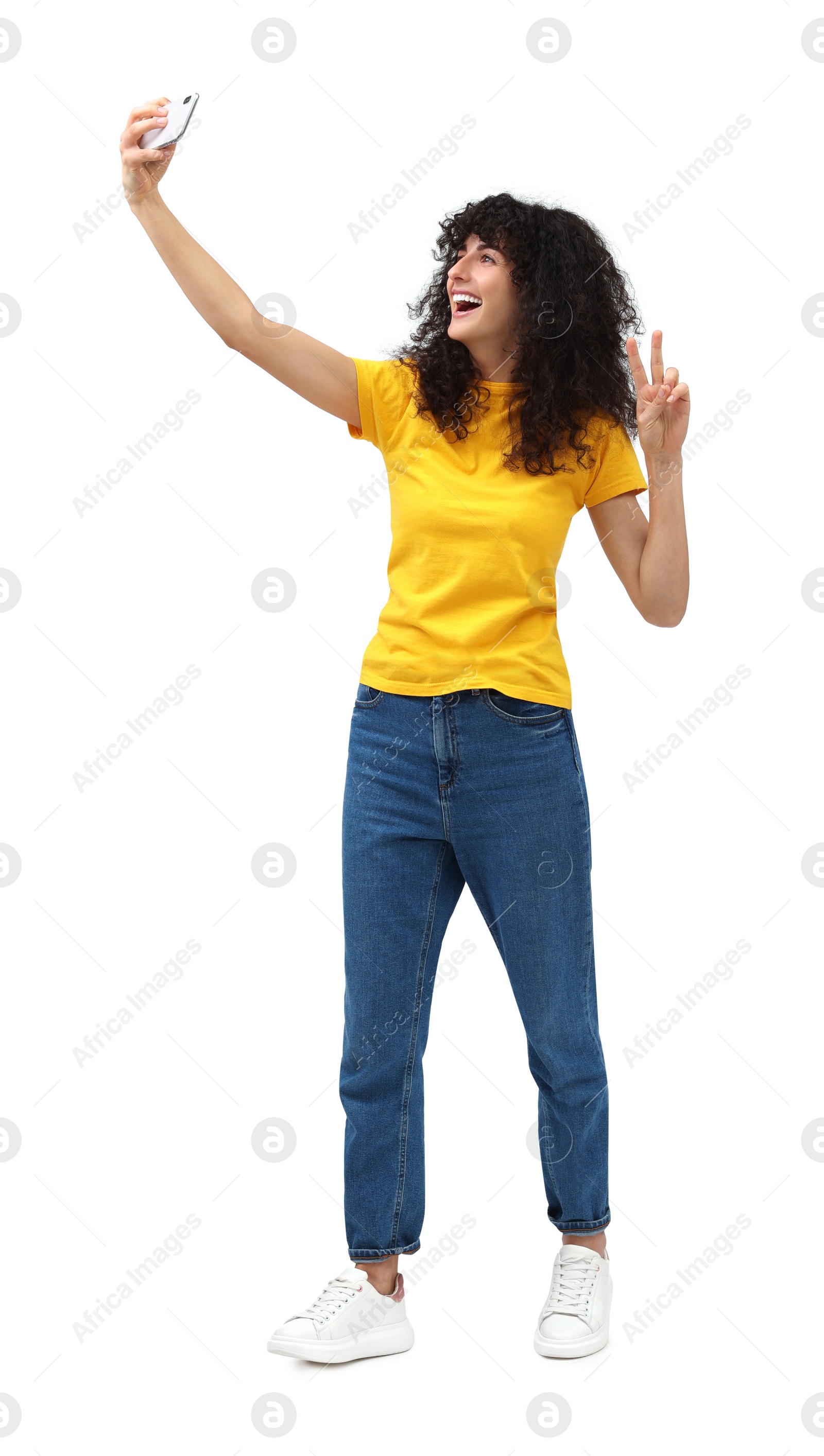 Photo of Beautiful young woman taking selfie on white background