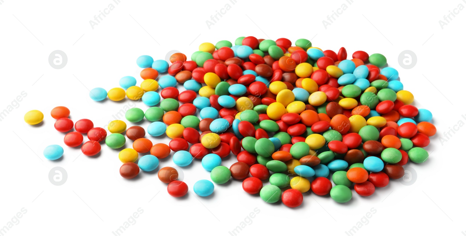 Photo of Many small colorful candies on white background