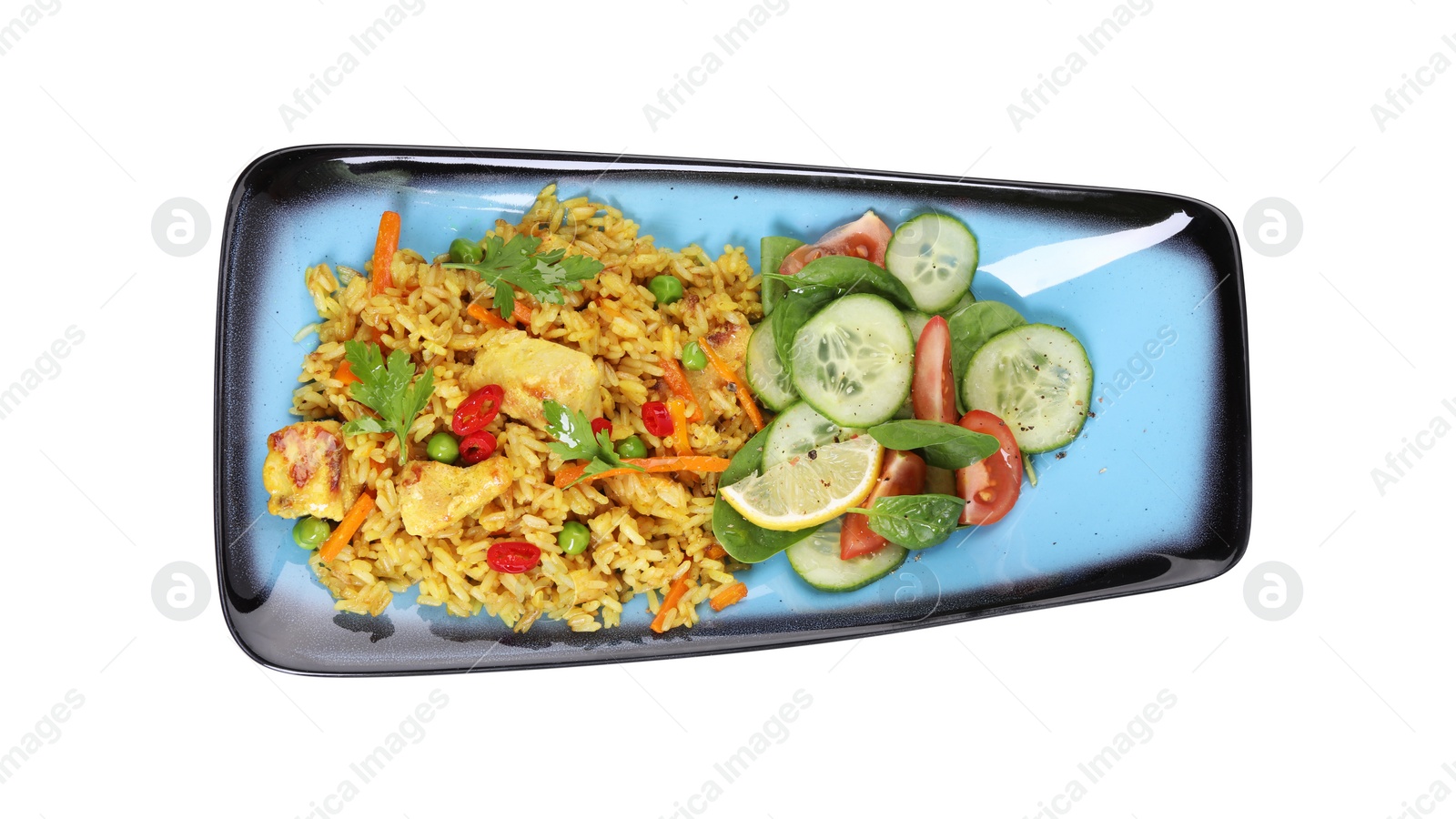 Photo of Tasty rice with meat and vegetables in plate isolated on white, top view