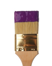Photo of Brush with purple paint on white background, closeup