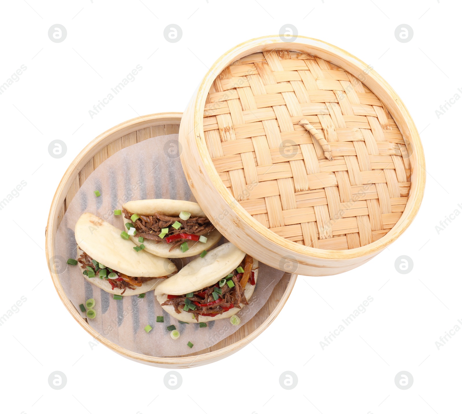 Photo of Delicious gua bao (pork belly buns) in bamboo steamer isolated on white, top view