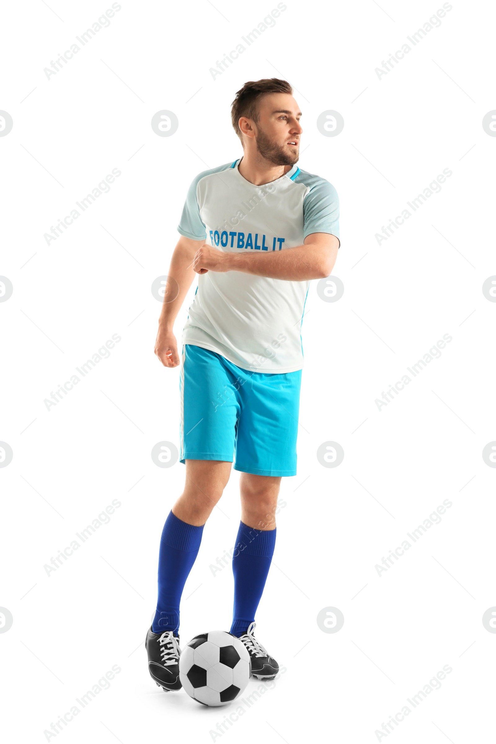 Photo of Young man playing football on white background