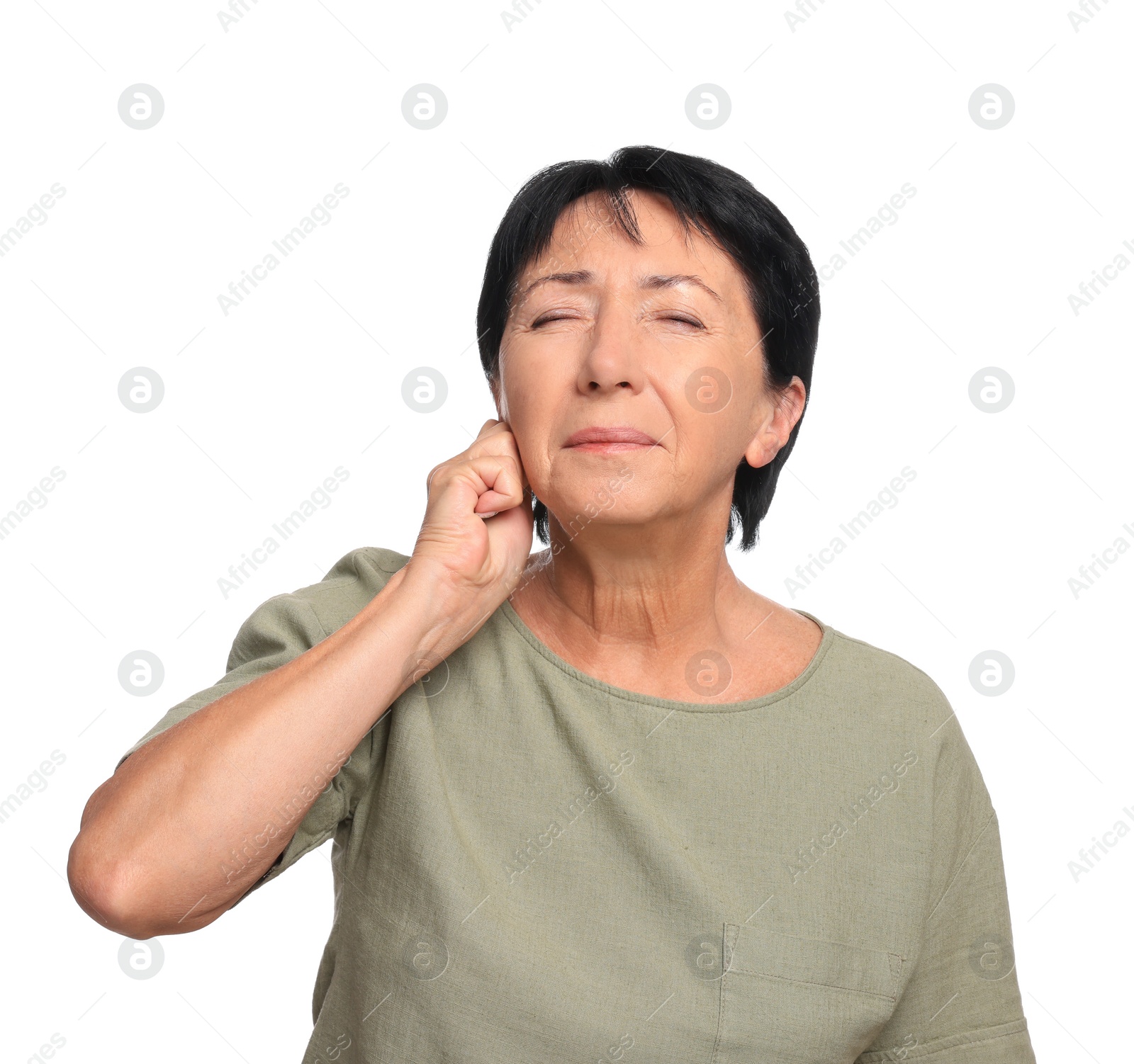 Photo of Senior woman suffering from ear pain on white background