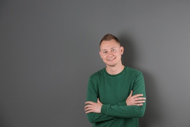 Portrait of handsome man on color background