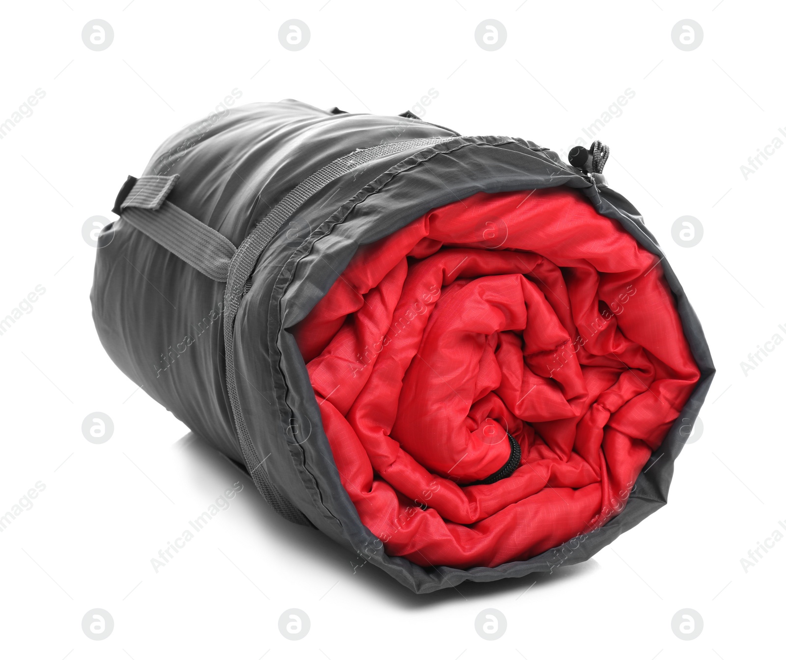 Photo of Sleeping bag in case on white background. Camping equipment