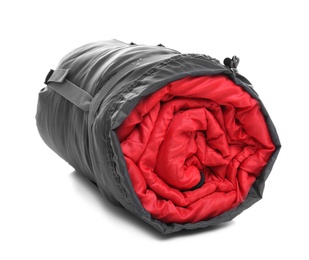 Photo of Sleeping bag in case on white background. Camping equipment