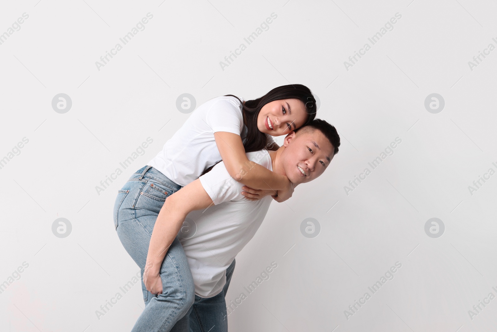 Photo of Portrait of happy couple on white background