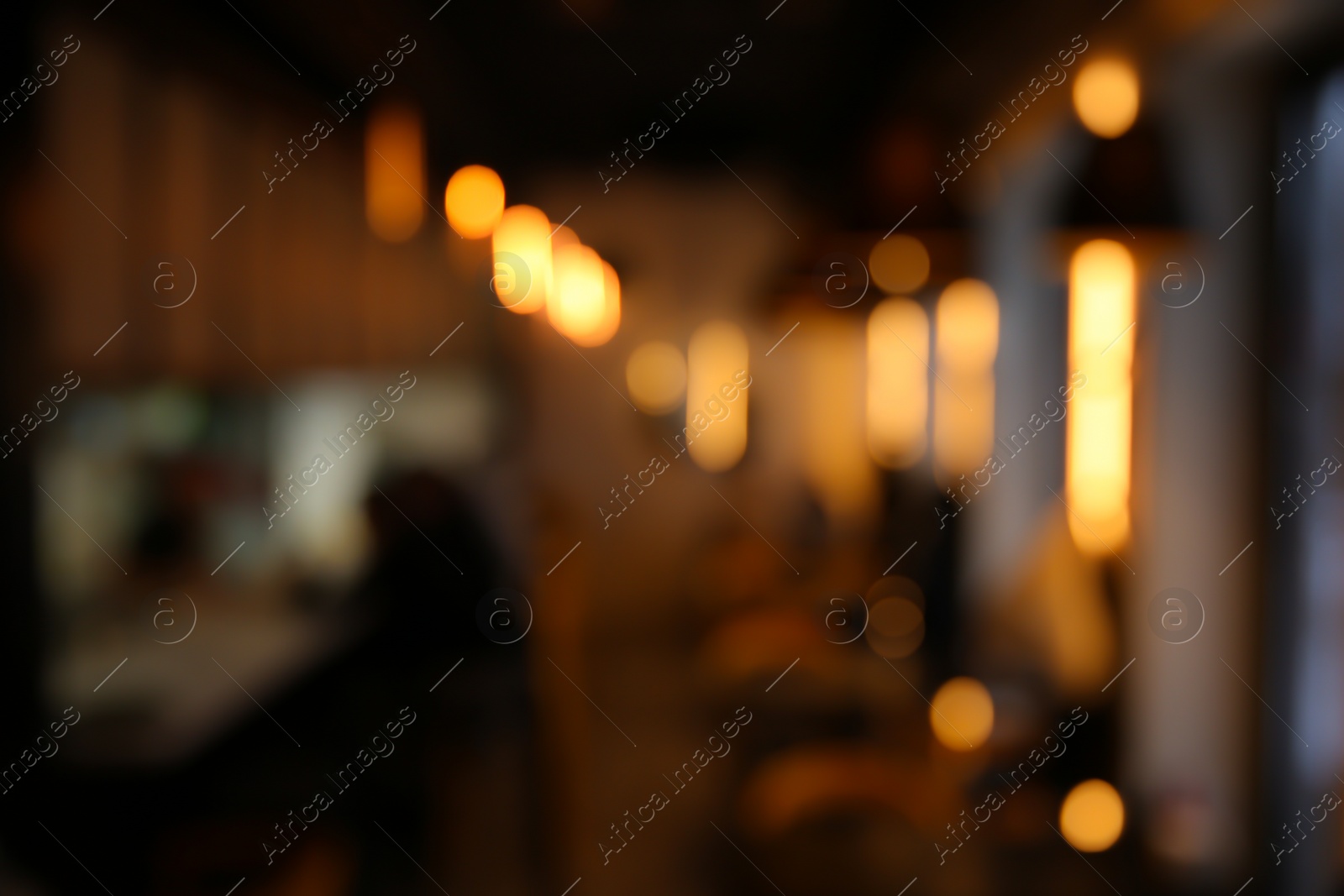 Photo of Blurred view of stylish modern cafe interior