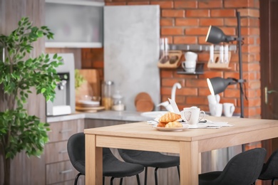 Photo of Stylish kitchen interior in apartment. Idea for home design