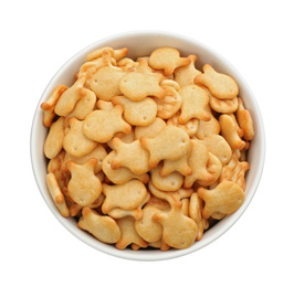Photo of Delicious goldfish crackers in bowl isolated on white, top view