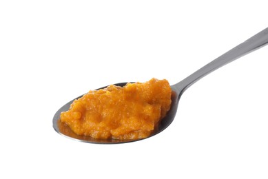 Photo of Spoon with orange tasty puree on white background