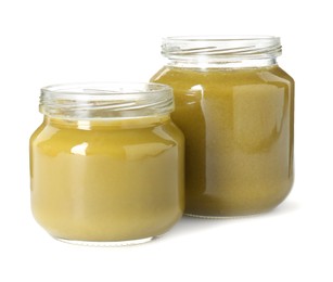 Photo of Baby food. Tasty healthy puree in jars isolated on white