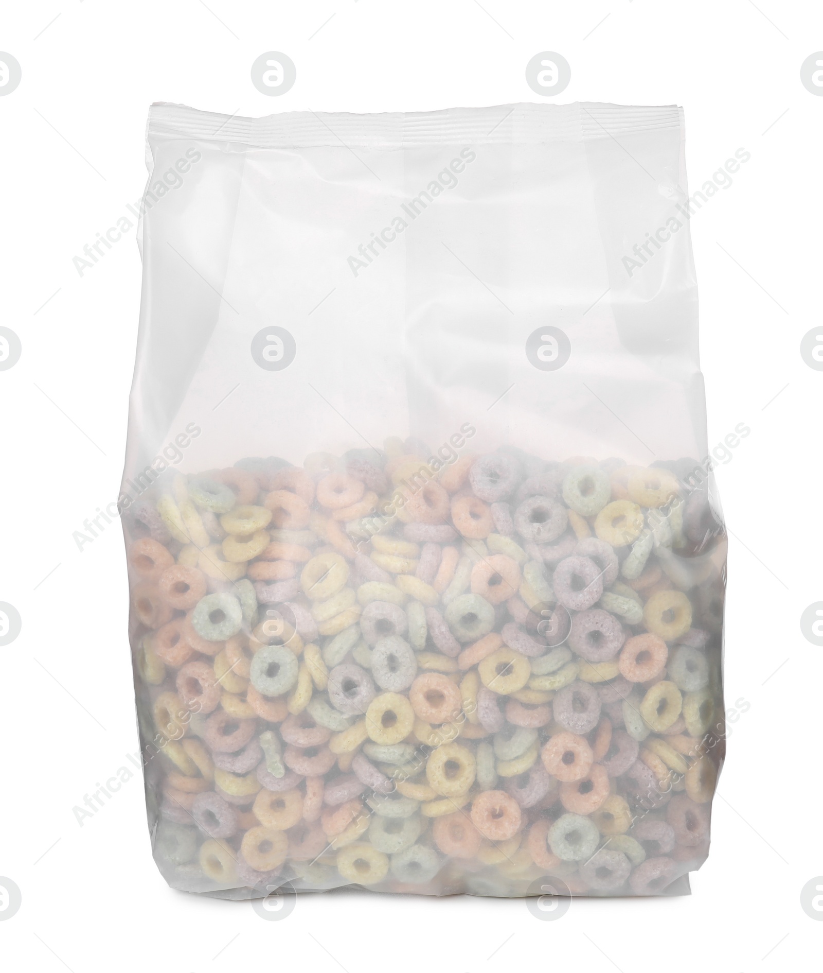 Photo of Tasty cereal rings in transparent plastic pack isolated on white