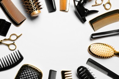 Frame of hairdressing tools on white background, flat lay. Space for text