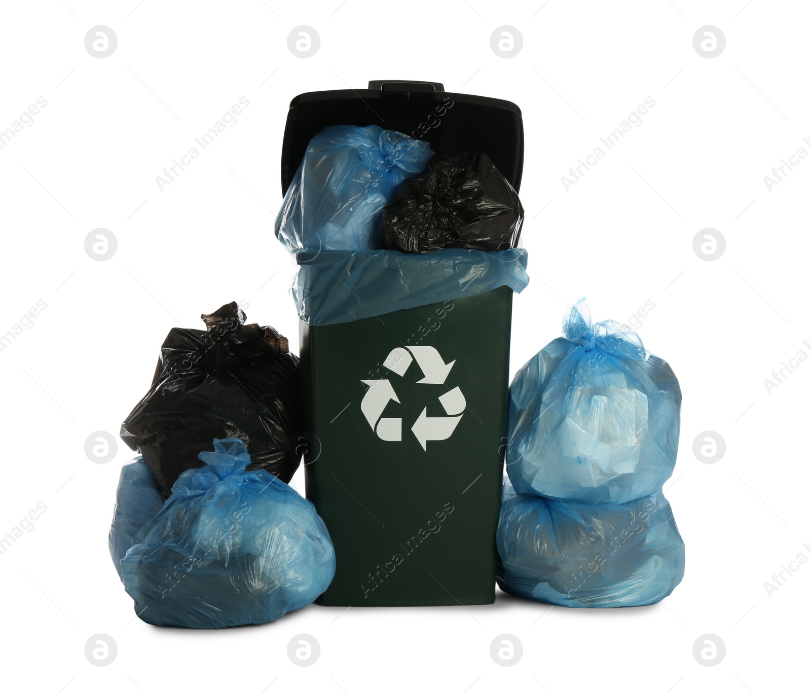 Photo of Dark green recycling bin overfilled with garbage bags on white background