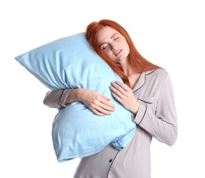 Photo of Young woman wearing pajamas with pillow in sleepwalking state on white background