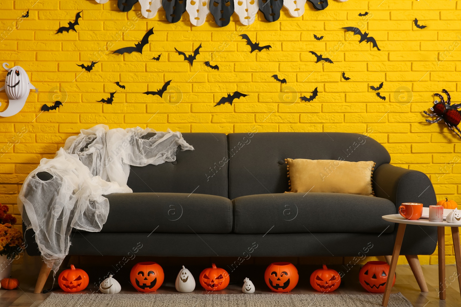 Photo of Modern room decorated for Halloween. Festive interior