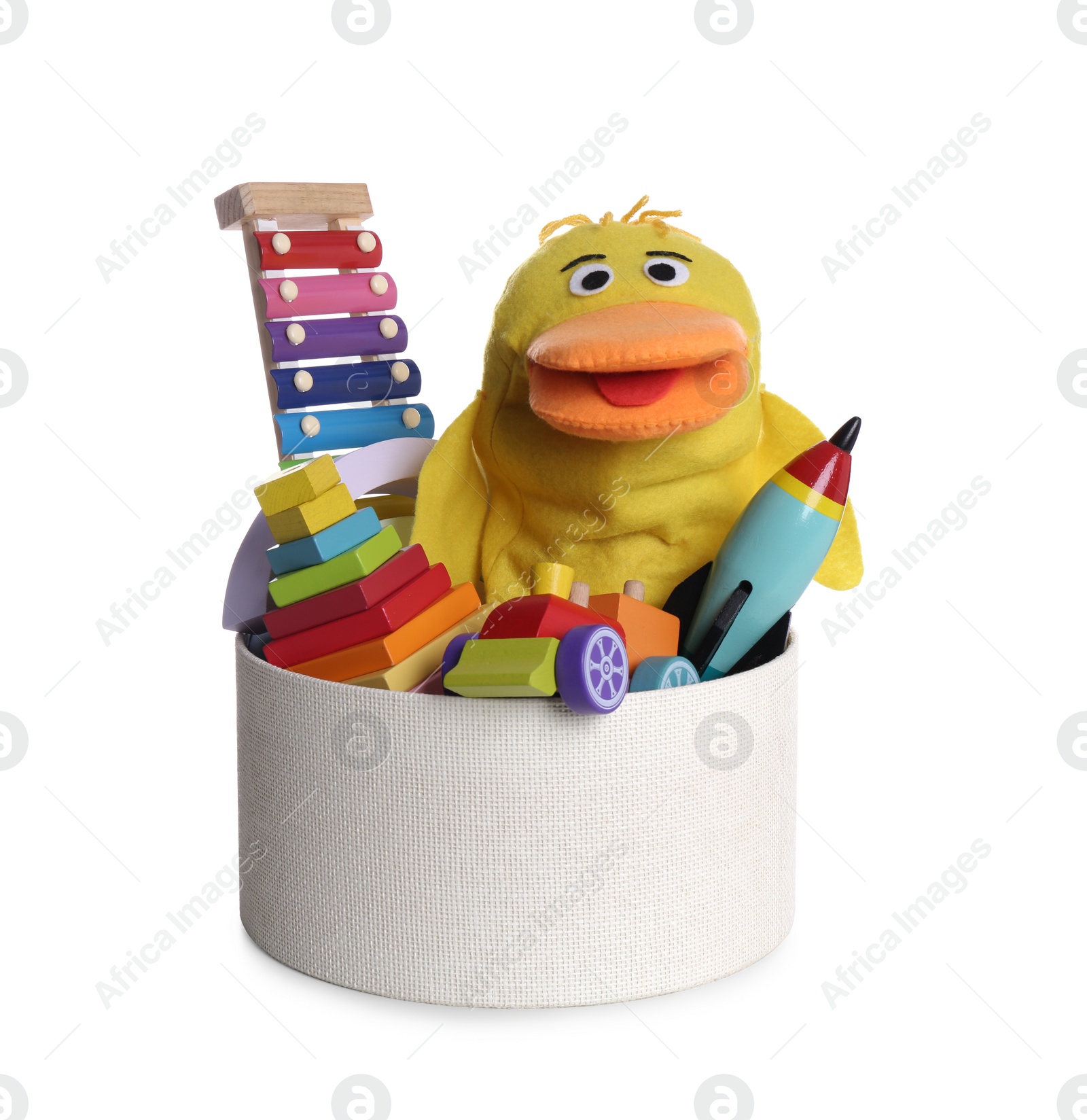 Photo of Box with different cute toys on white background