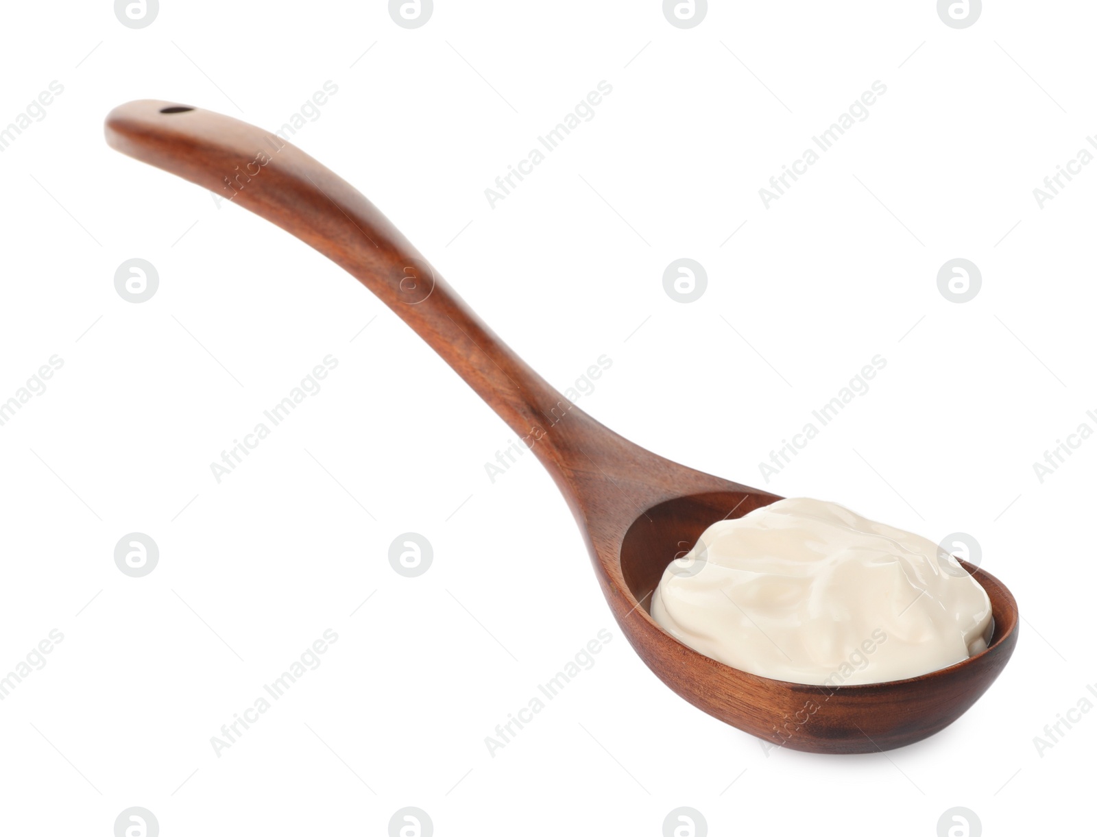 Photo of Wooden spoon with tasty mayonnaise isolated on white