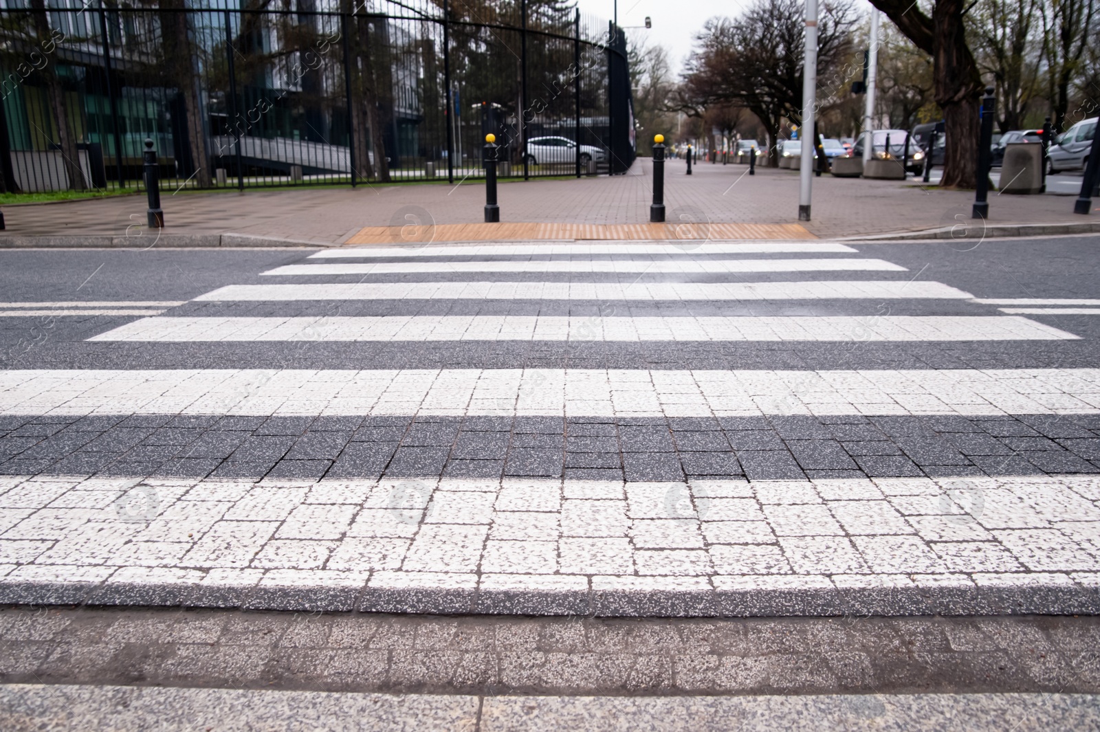 Photo of View on pedestrian crossing in city. Road regulations