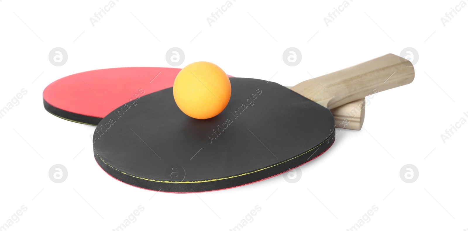 Photo of Ping pong rackets and ball isolated on white