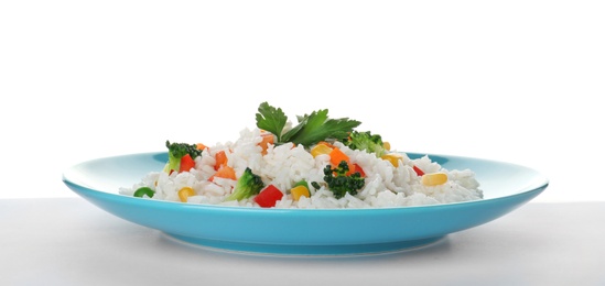 Photo of Plate with tasty rice and vegetables on white background