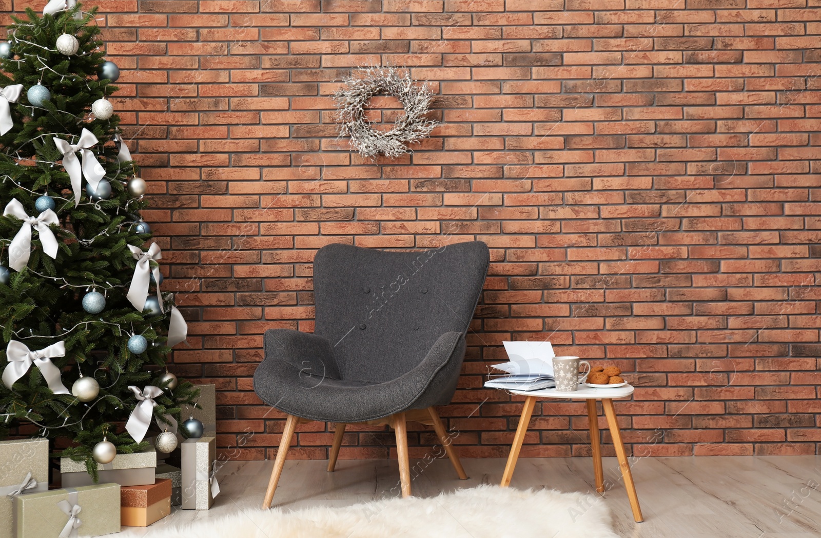 Photo of Stylish living room interior with decorated Christmas tree