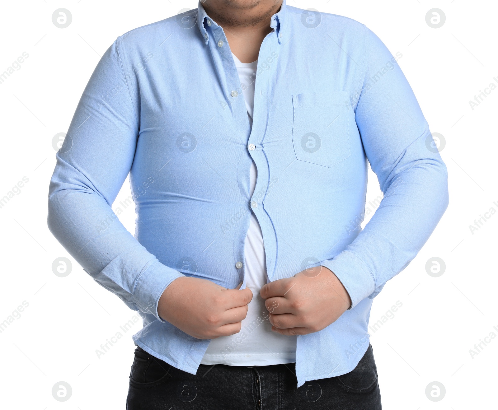 Photo of Overweight man trying to button up tight shirt on white background, closeup