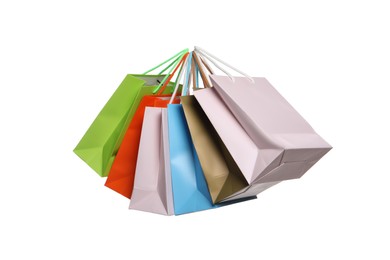 Photo of Colorful paper shopping bags isolated on white