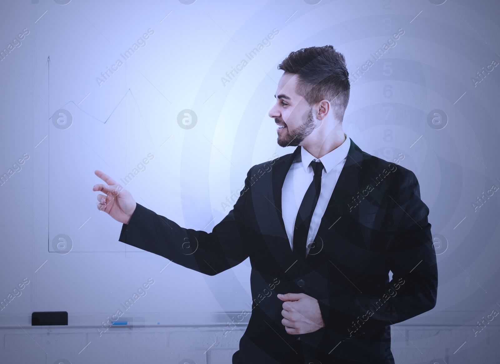 Image of Young businessman in office and dart board. Double exposure 