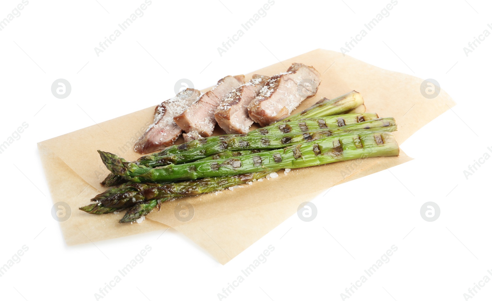 Photo of Tasty meat with grilled asparagus isolated on white