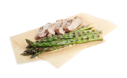 Photo of Tasty meat with grilled asparagus isolated on white