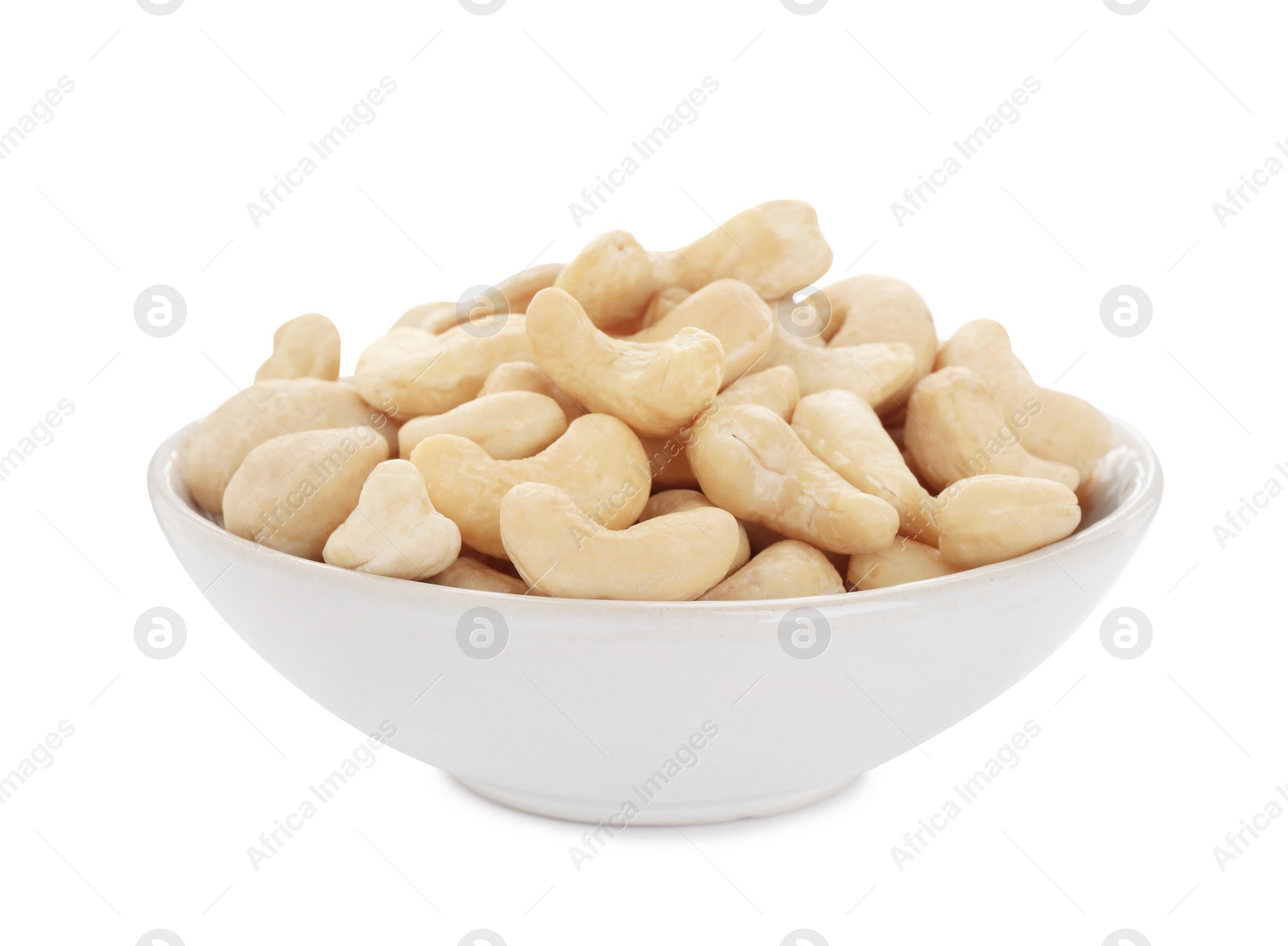 Photo of Bowl of tasty organic cashew nuts isolated on white