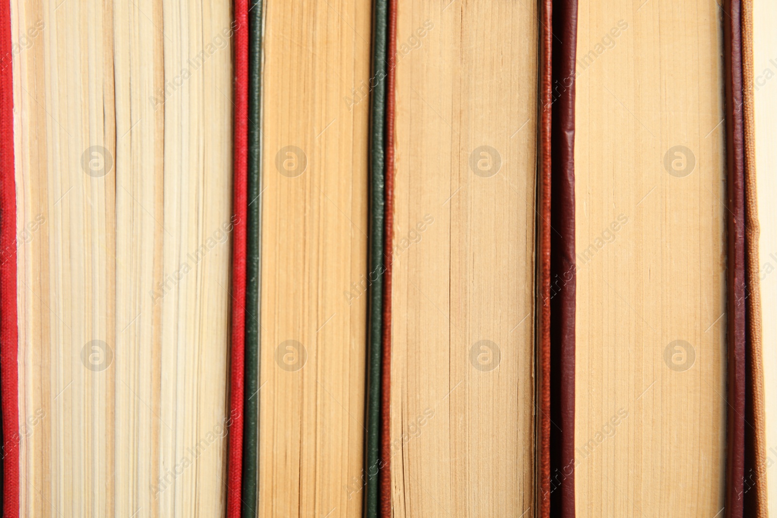 Photo of Collection of different old books as background