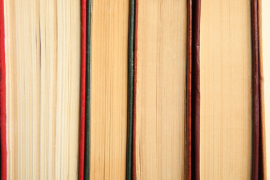 Photo of Collection of different old books as background