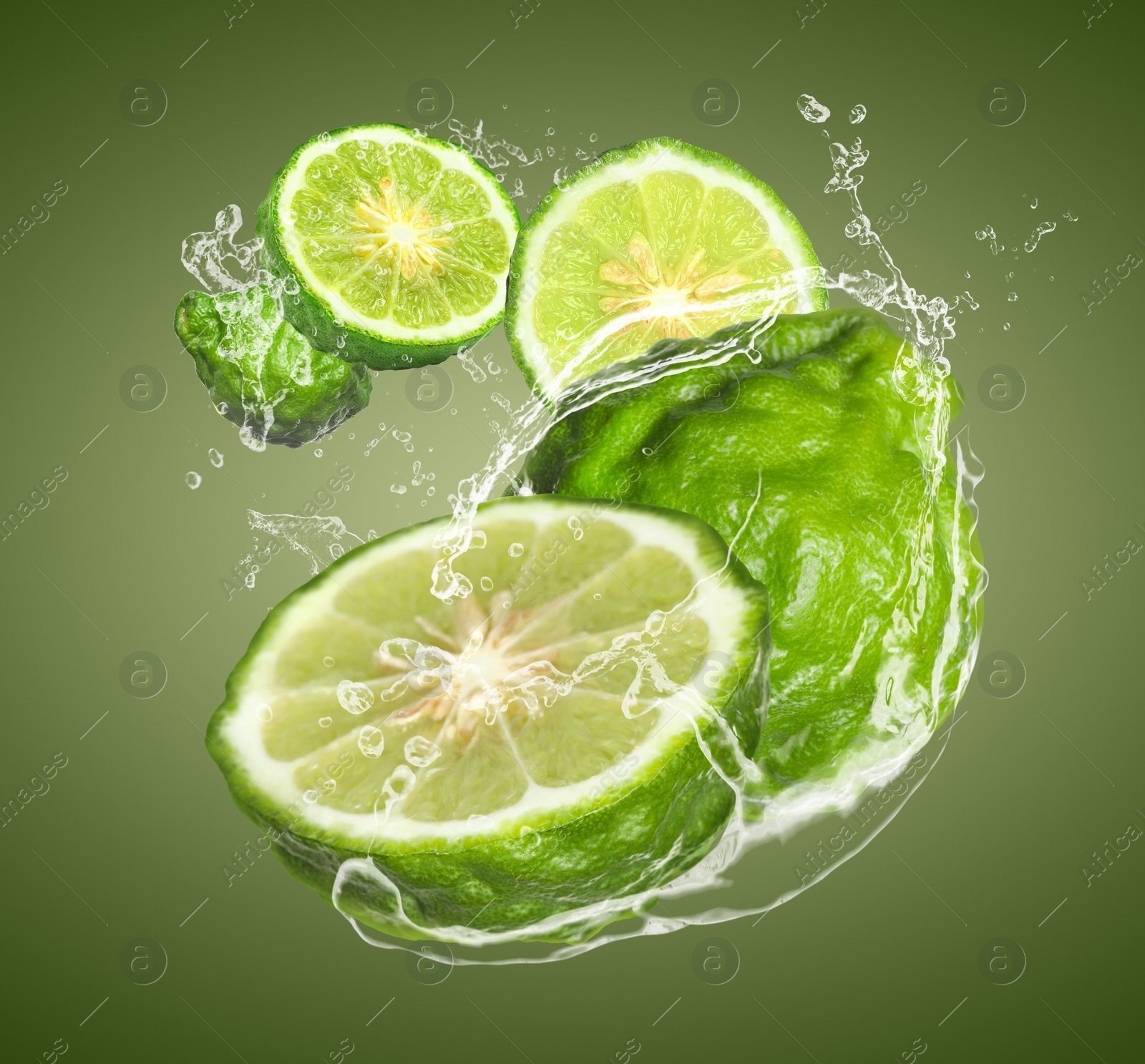 Image of Fresh ripe bergamot fruits and splashing water on color background