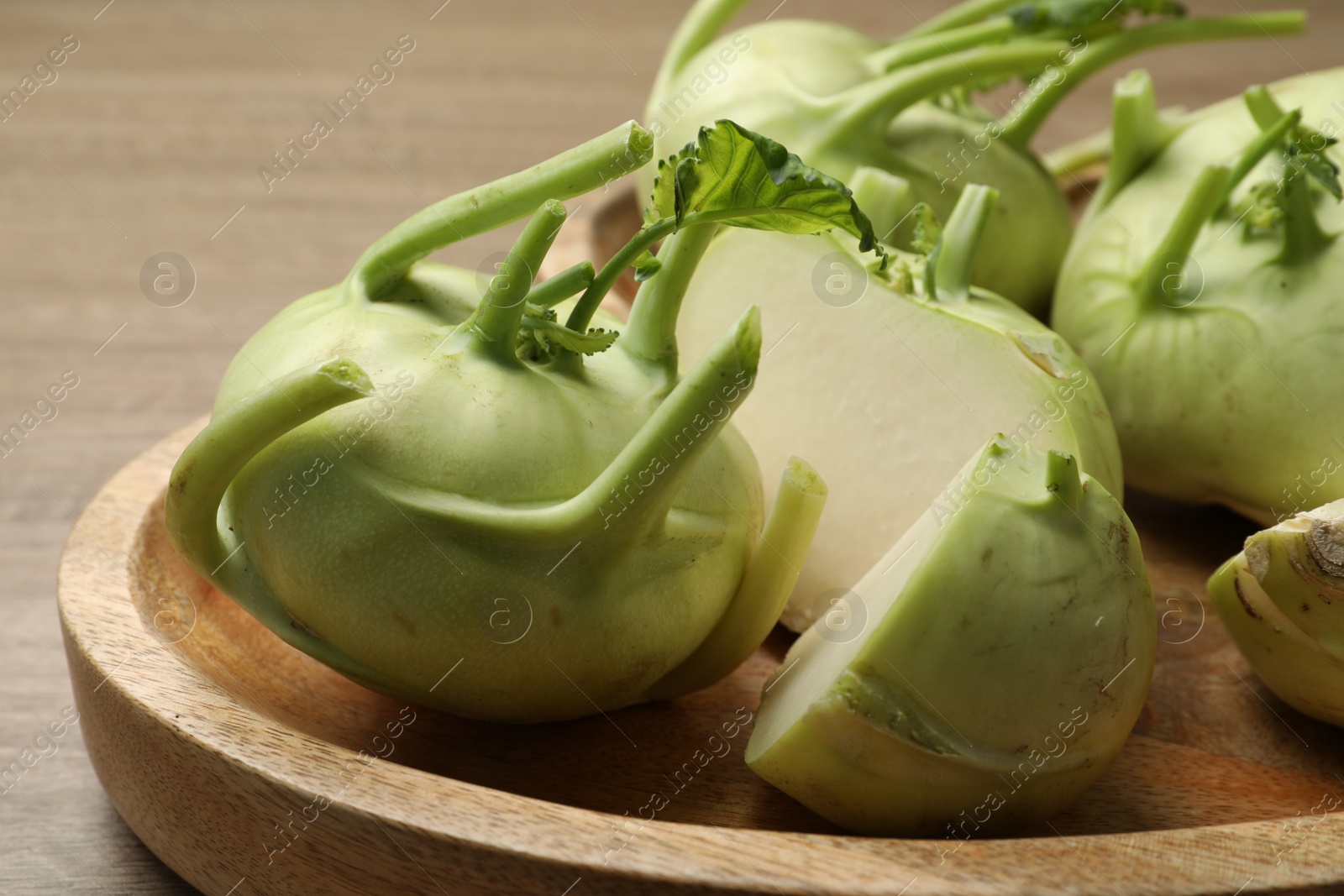 Photo of Ripe kohlrabi plants on plate, closeup view