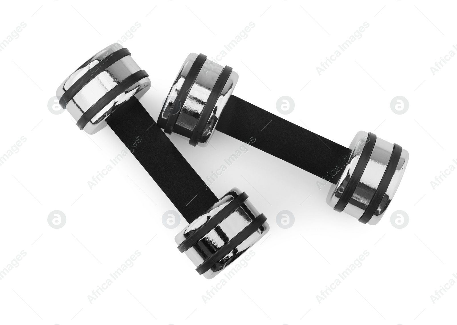 Photo of Metal dumbbells isolated on white, top view. Sports equipment