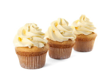 Delicious birthday cupcakes decorated with cream on white background