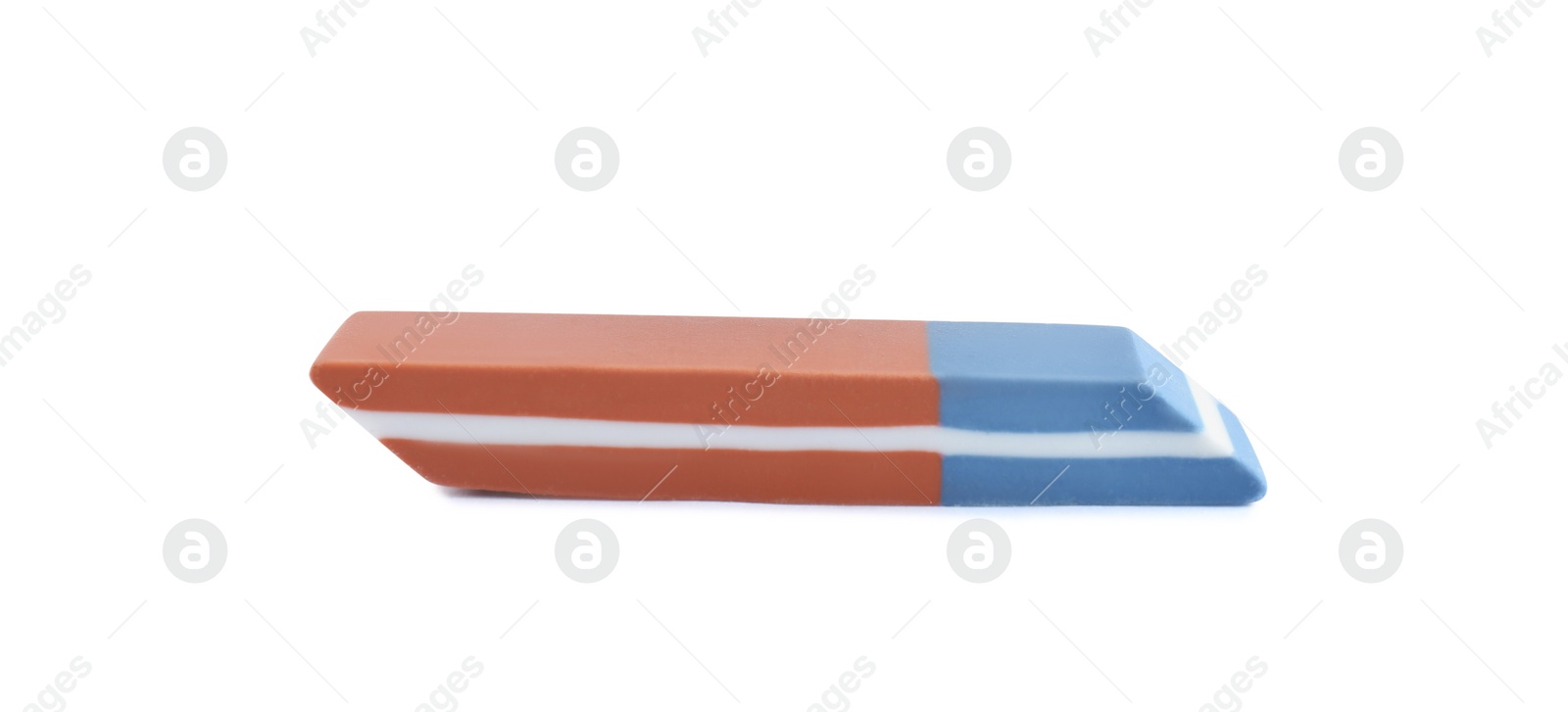 Photo of New double eraser isolated on white. School stationery