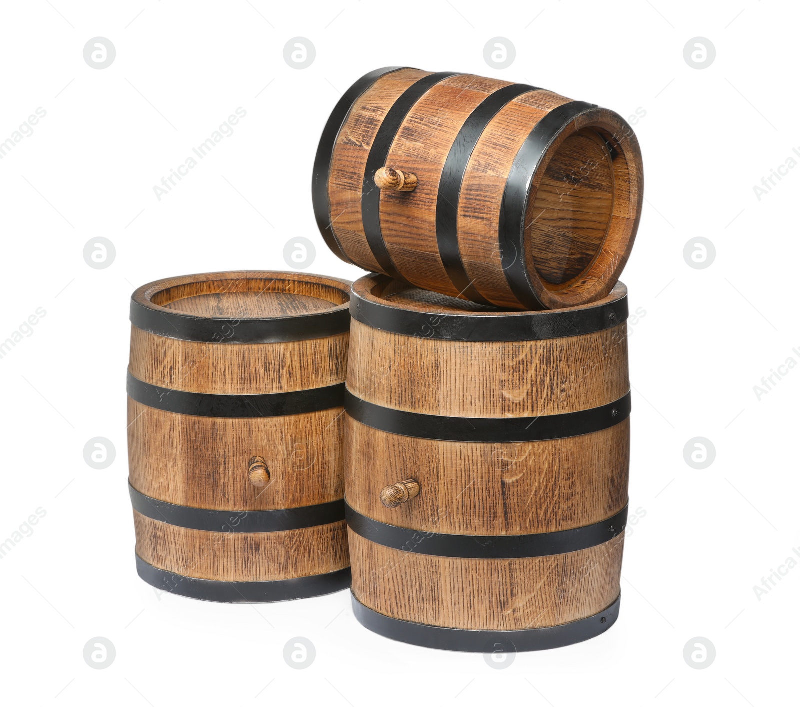 Photo of Three traditional wooden barrels on white background