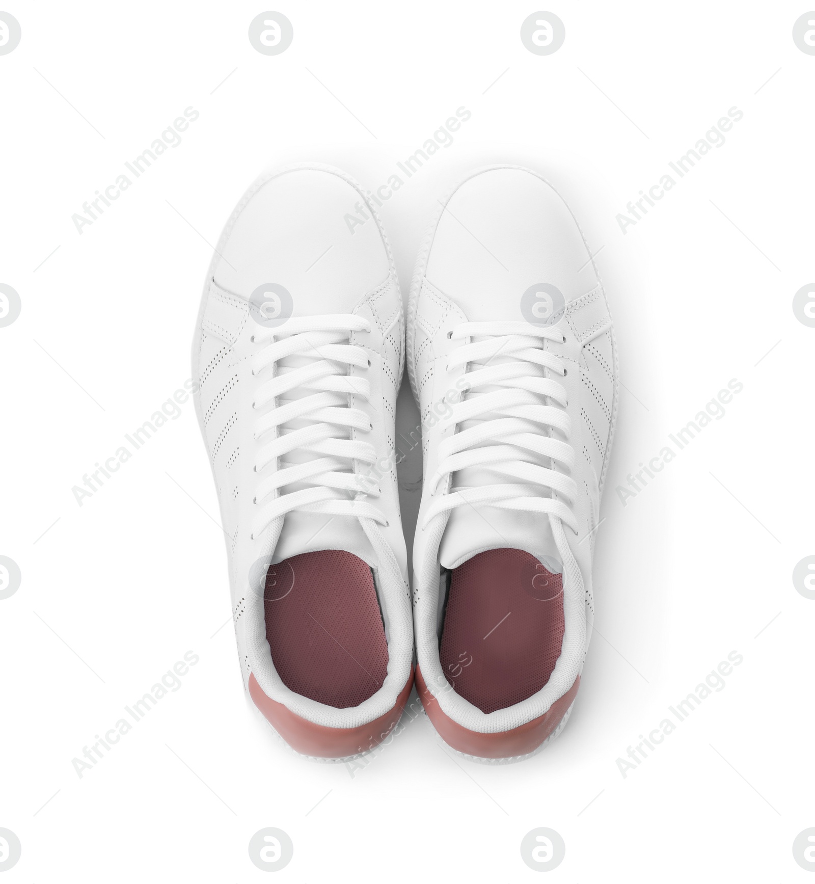 Photo of Pair of trendy sneakers on white background, top view