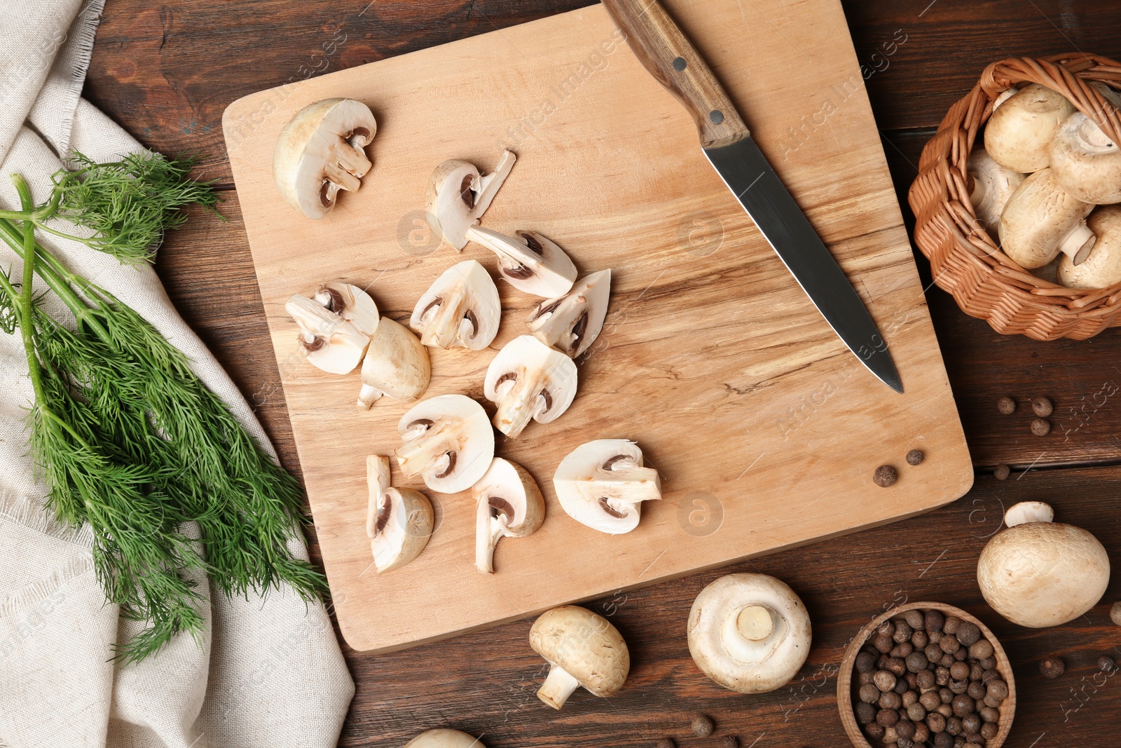 Photo of Flat lay composition with fresh champignon mushrooms on wooden table