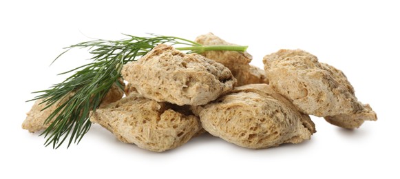 Photo of Dehydrated soy meat chunks with dill on white background