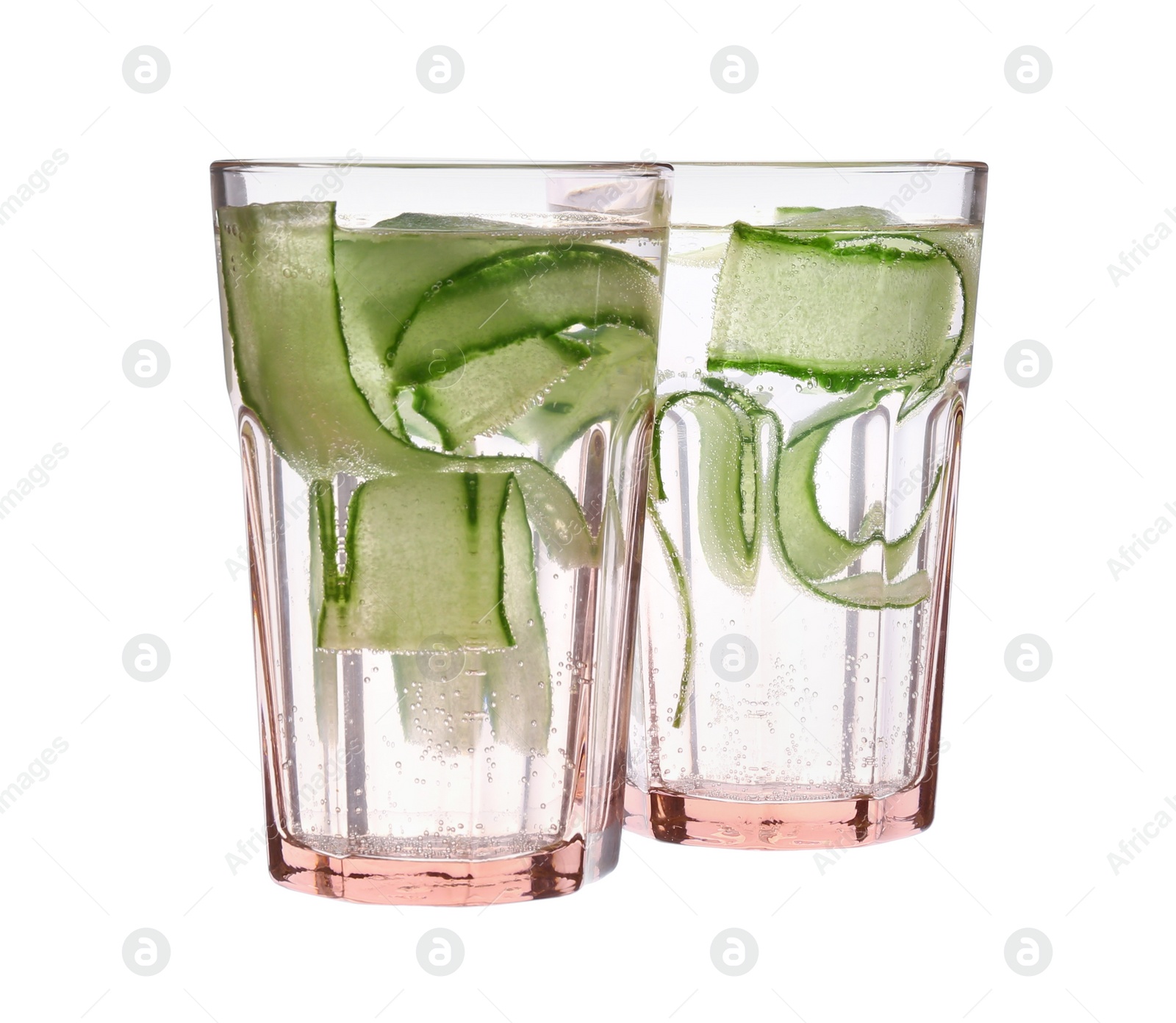Photo of Refreshing infused cucumber water in glasses on white background