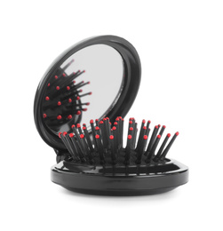 Round folding hair brush with mirror isolated on white