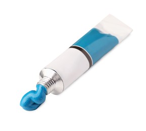 Photo of Tube with blue oil paint on white background