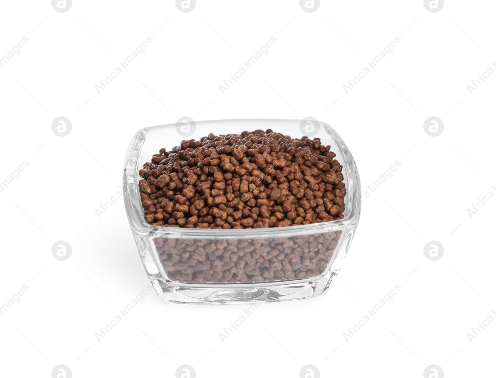 Photo of Buckwheat tea granules in glass bowl on white background